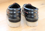 Chaussures bateau en cuir noir sur semelle épaisse