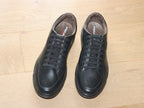 Baskets basses en cuir noir semelle noire