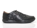 Baskets basses en cuir noir semelle noire