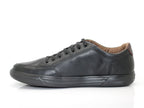 Baskets basses en cuir noir semelle noire