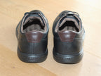 Baskets basses en cuir noir semelle noire