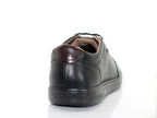 Baskets basses en cuir noir semelle noire