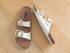 Sandales mule en cuir doré