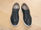 Baskets en cuir noir et semelle blanche