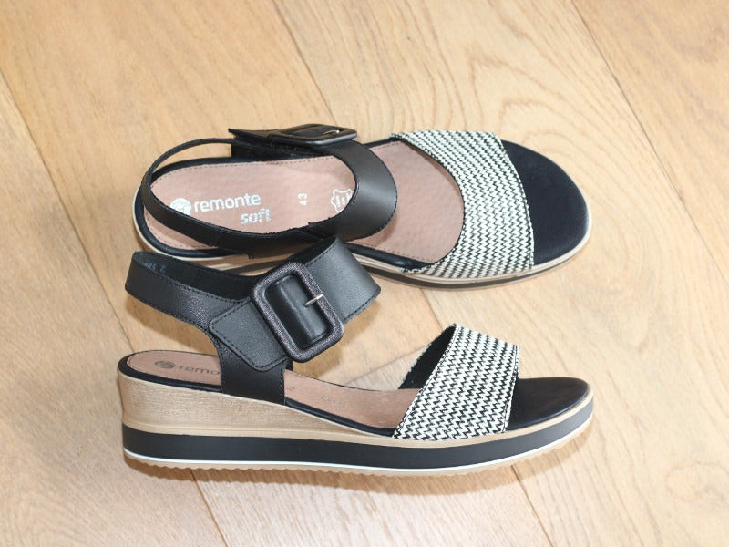 Sandales à talon compensé en cuir noir et blanc Pierrot