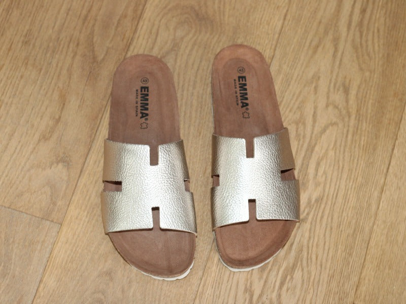 Mules plates en cuir doré Emma