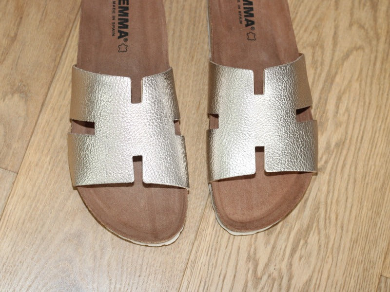 Mules plates en cuir doré Emma