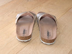 Mules plates en cuir doré Emma