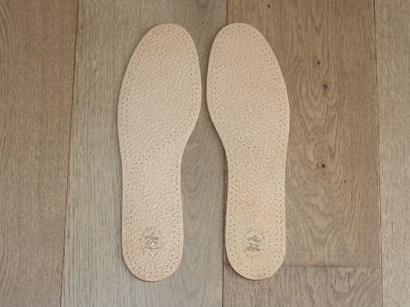 Semelle en cuir et charbon