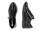 Baskets compensées Remonte en cuir noir verni