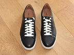 Baskets Cleve en cuir noir et semelle blanche