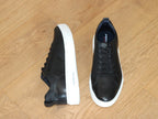 Baskets noires Pegada en cuir