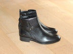 Bottines plates en cuir noir