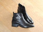 Bottines plates en cuir noir